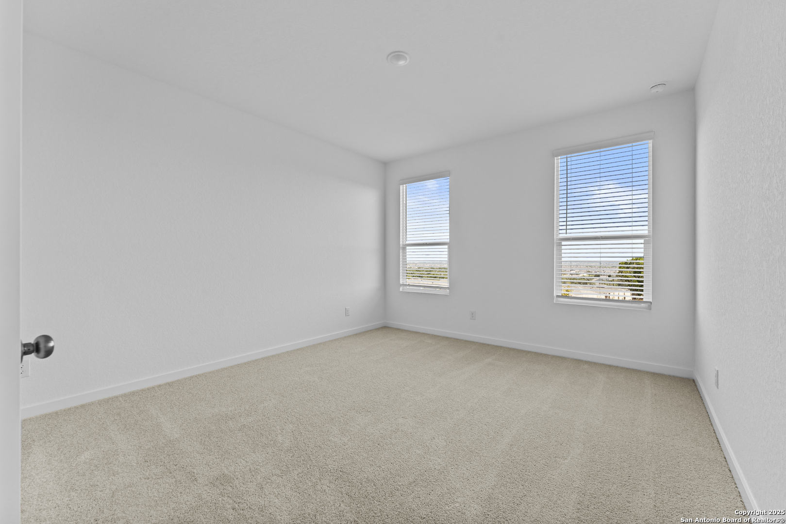 14926 Taradeau San Antonio, TX 78254 - Photo 8 of 25 an empty room with windows
