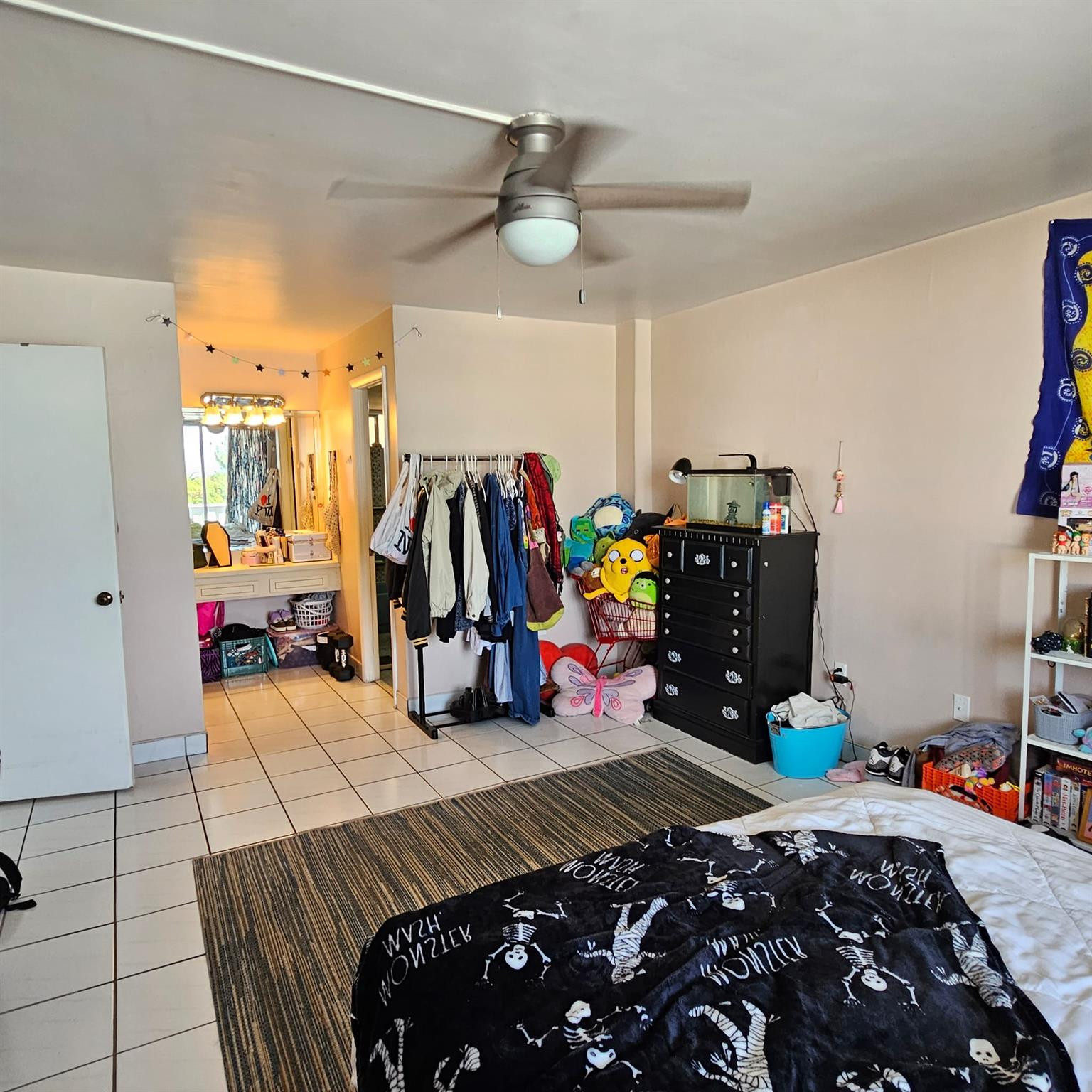 8530 Byron Avenue, Unit 406 Miami Beach, FL 33141 - Photo 18 of 35 a bed room with a bed and a walk in closet