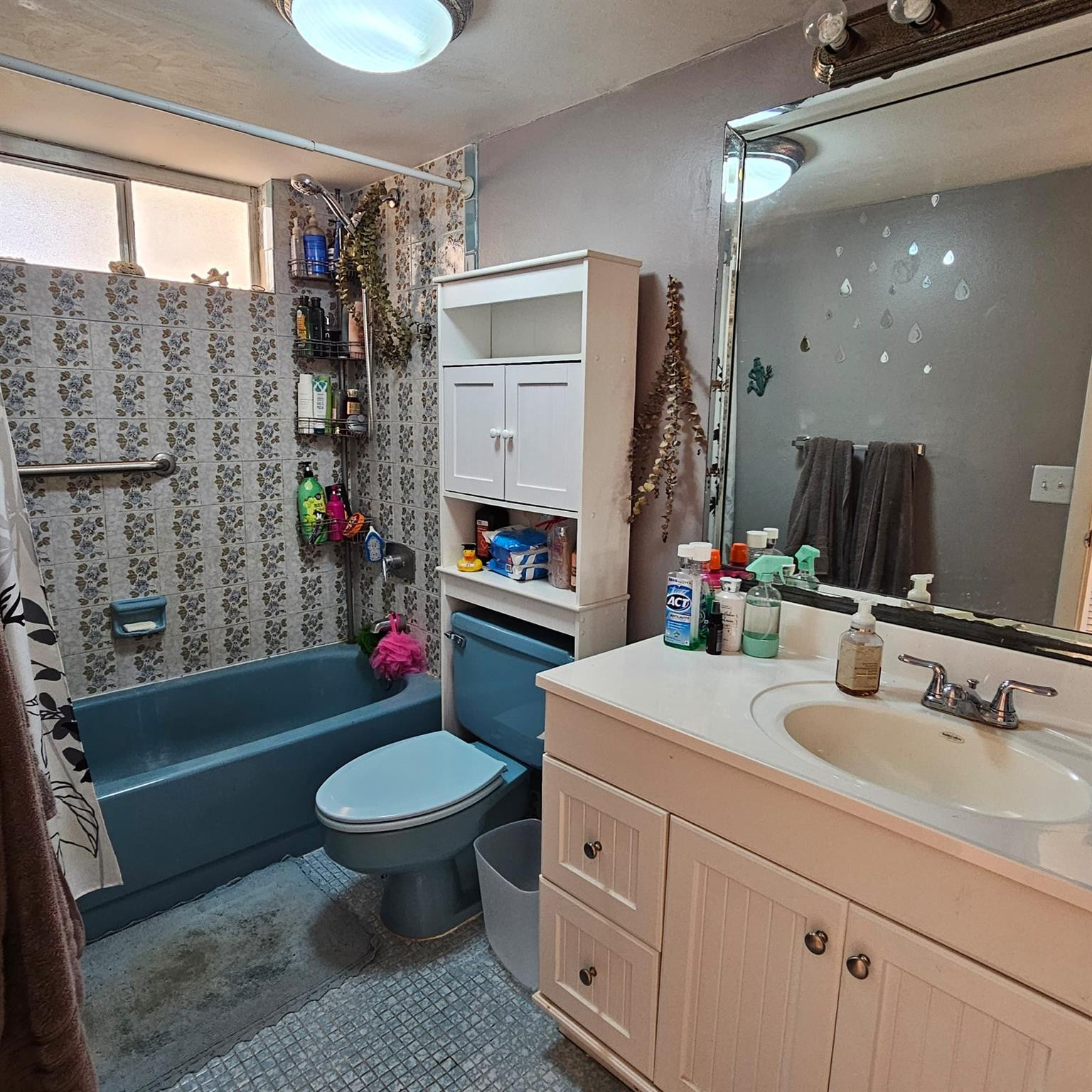 8530 Byron Avenue, Unit 406 Miami Beach, FL 33141 - Photo 20 of 35 a bathroom with a sink a toilet and a mirror