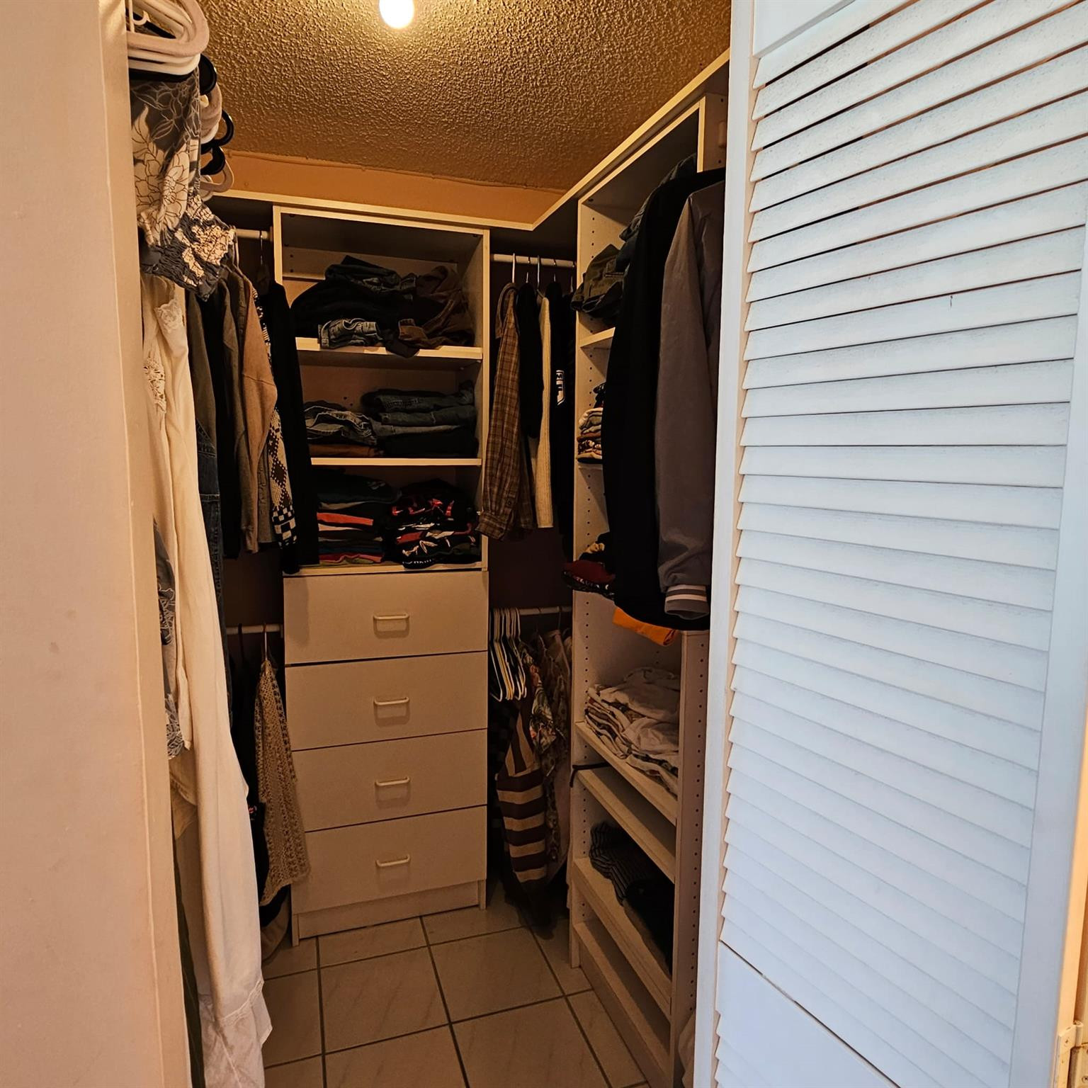 8530 Byron Avenue, Unit 406 Miami Beach, FL 33141 - Photo 21 of 35 a view of walk in closet