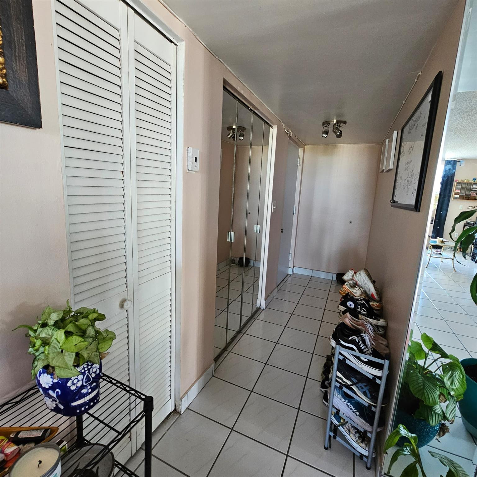8530 Byron Avenue, Unit 406 Miami Beach, FL 33141 - Photo 26 of 35 a bath room with a potted plant