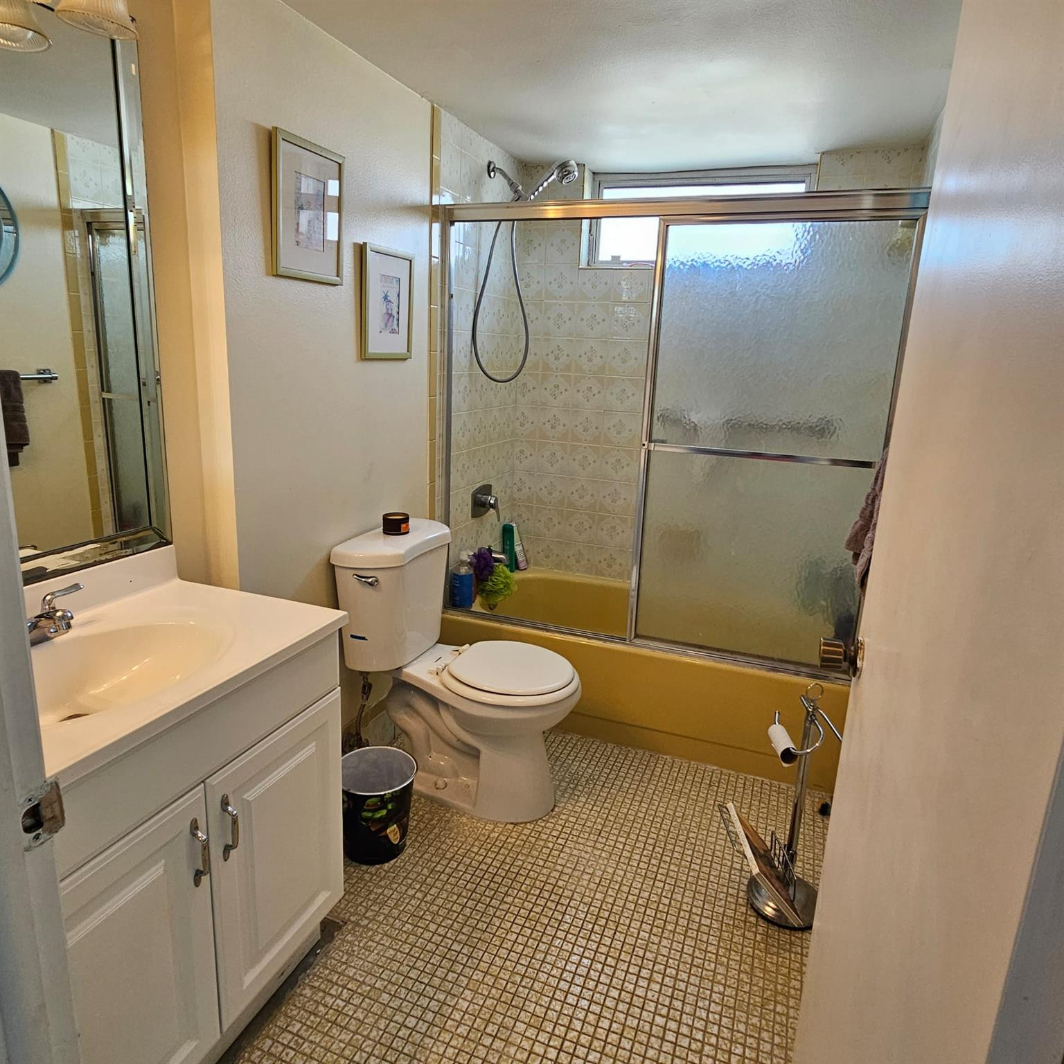 8530 Byron Avenue, Unit 406 Miami Beach, FL 33141 - Photo 8 of 35 a bathroom with a toilet sink and shower