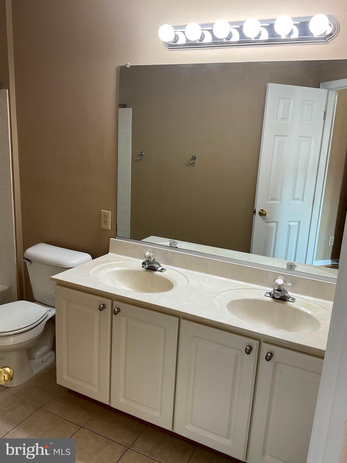 2152 Bristol Drive, Unit 4 Frederick, MD 21702 - Photo 11 of 12 a bathroom with a sink and a toilet
