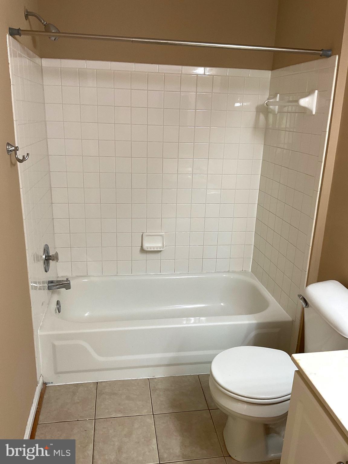 2152 Bristol Drive, Unit 4 Frederick, MD 21702 - Photo 12 of 12 a bathroom with a toilet and a bathtub