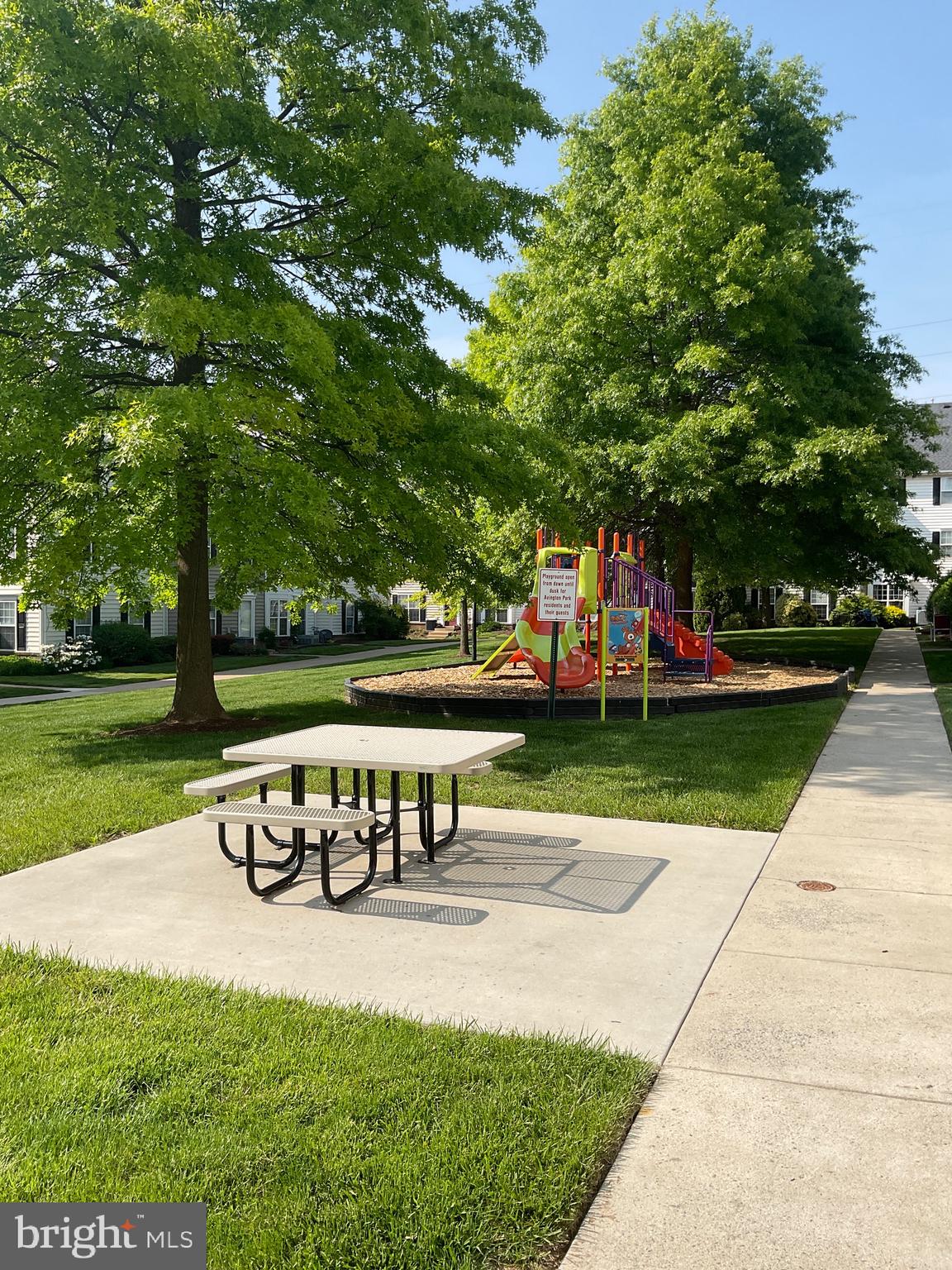 2152 Bristol Drive, Unit 4 Frederick, MD 21702 - Photo 2 of 12 a view of a park with bench