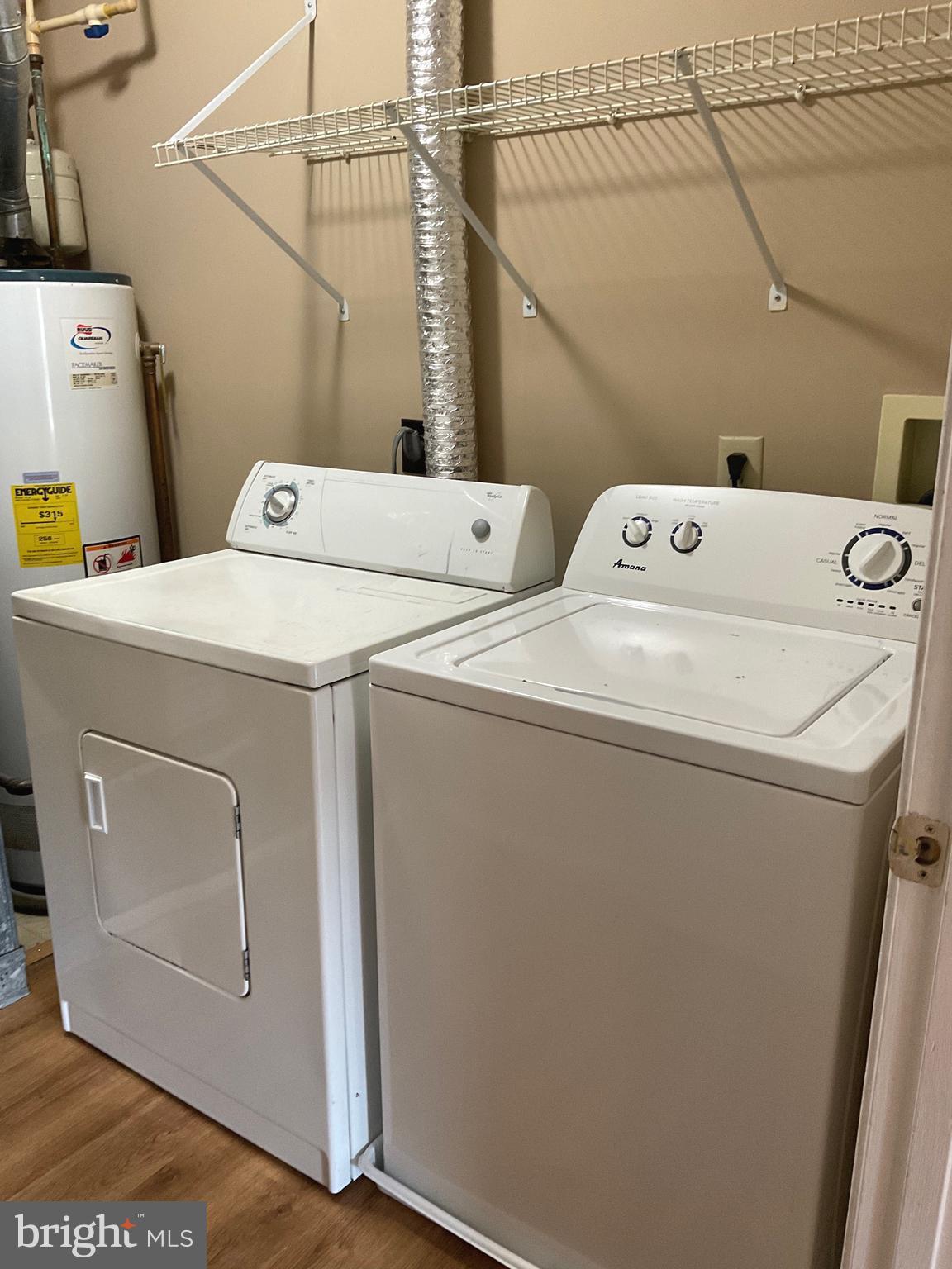 2152 Bristol Drive, Unit 4 Frederick, MD 21702 - Photo 9 of 12 a utility room with dryer and washer