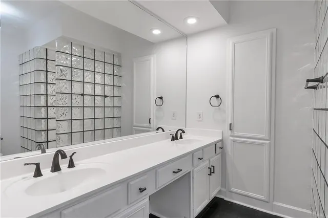 a bathroom with a shower curtain and a toilet