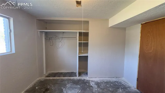 a view of a bathroom from a hallway