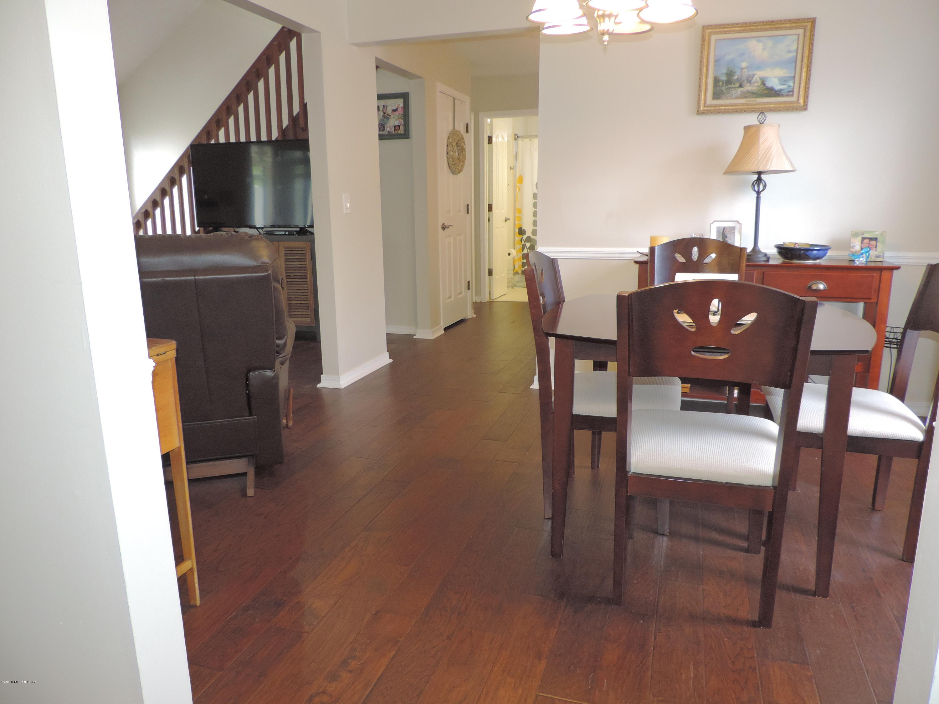 7024 St Augustine Road Jacksonville, FL 32217 - Photo 11 of 34 a view of a dining room with furniture