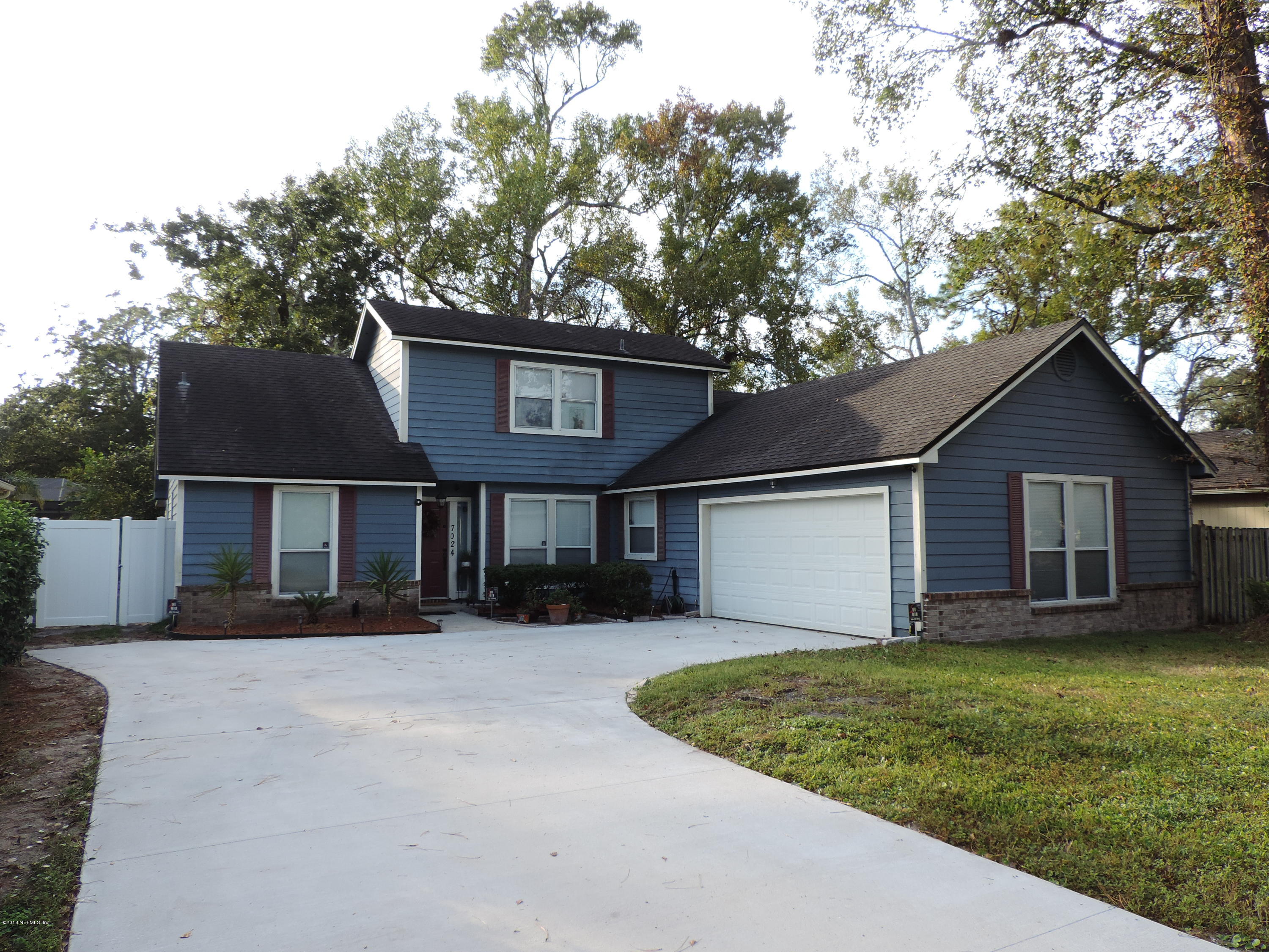 7024 St Augustine Road Jacksonville, FL 32217 - Photo 34 of 34 front view of a house with a yard