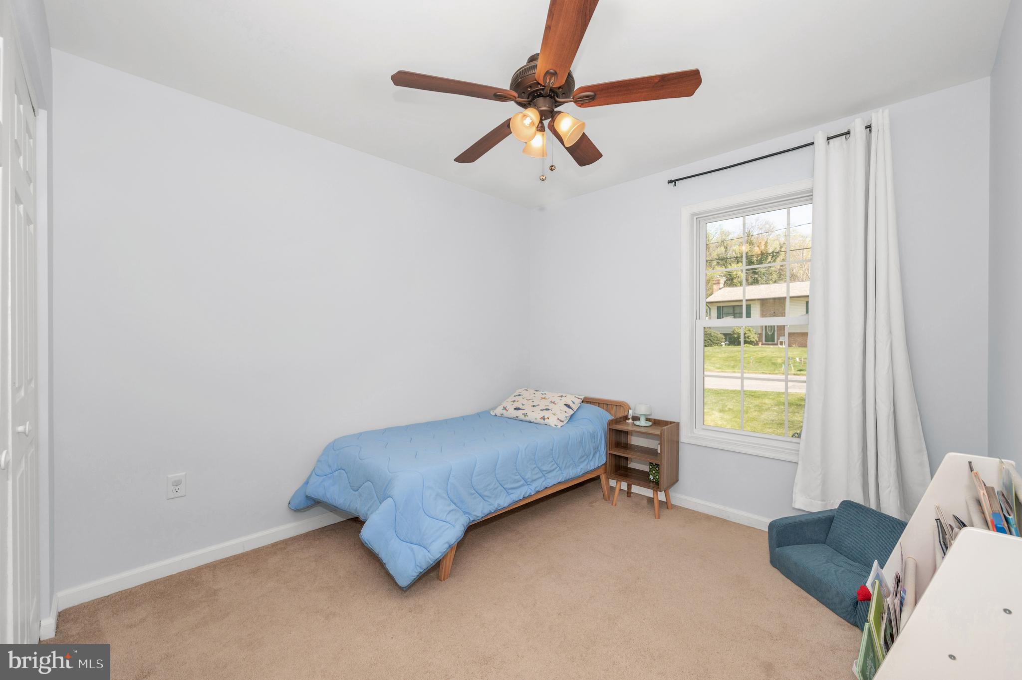 1107 2nd Avenue Brunswick, MD 21716 - Photo 22 of 52 a bedroom with a bed and a window