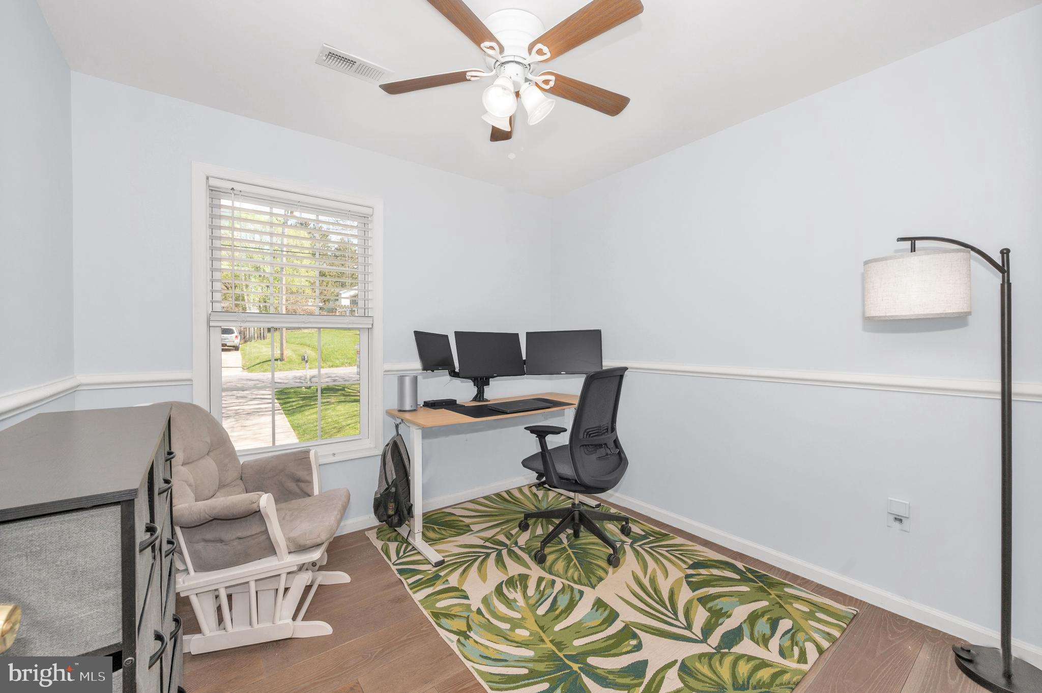 1107 2nd Avenue Brunswick, MD 21716 - Photo 24 of 52 a work room with furniture and a window