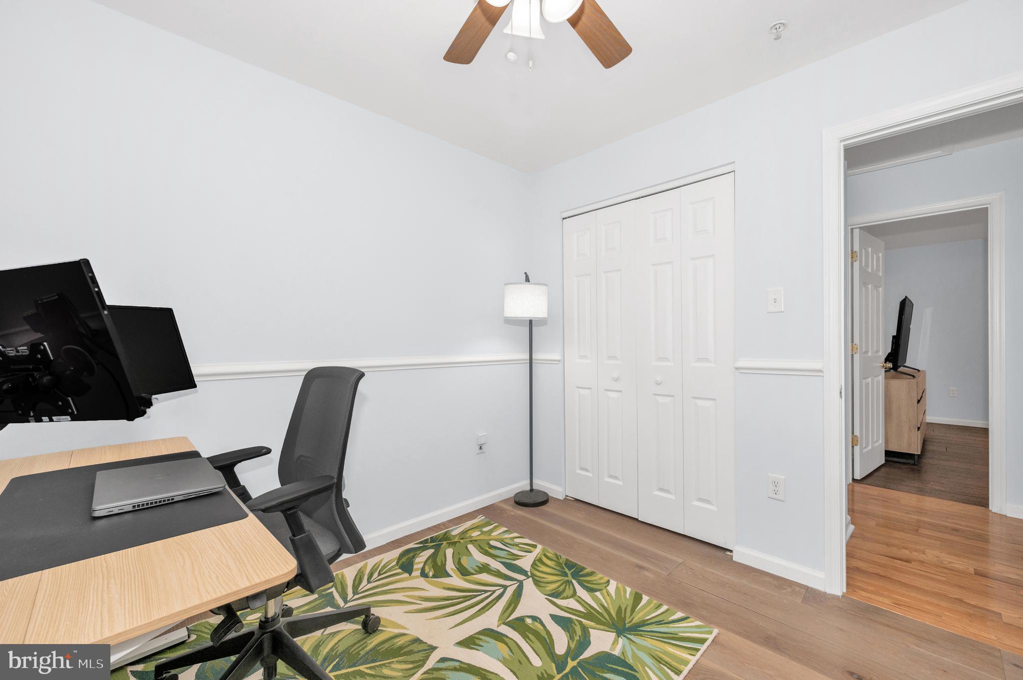 1107 2nd Avenue Brunswick, MD 21716 - Photo 25 of 52 a view of room with furniture and wooden floor