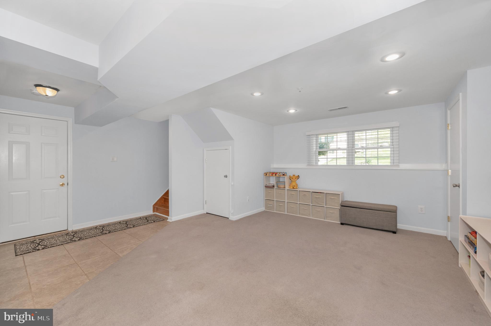 1107 2nd Avenue Brunswick, MD 21716 - Photo 31 of 52 a view of an empty room with a window
