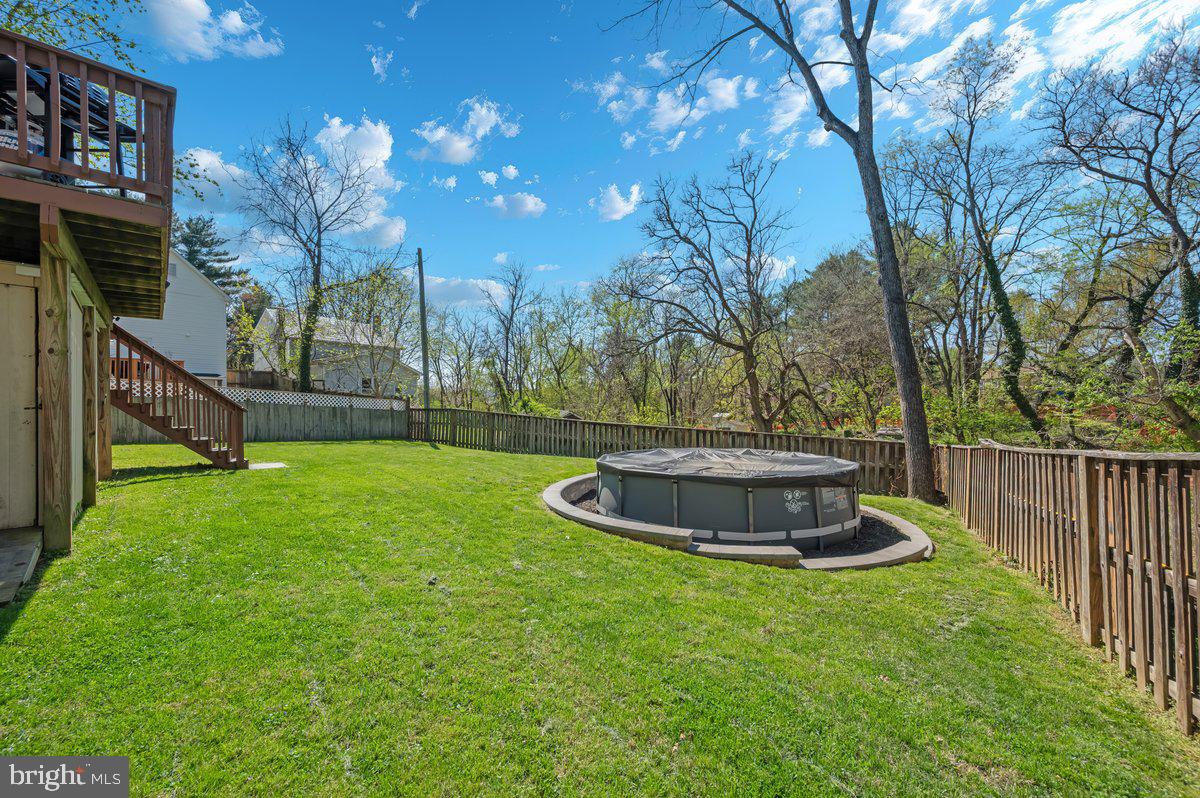 1107 2nd Avenue Brunswick, MD 21716 - Photo 42 of 52 a view of a garden with a slide