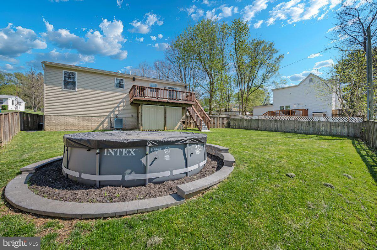 1107 2nd Avenue Brunswick, MD 21716 - Photo 43 of 52 a view of a house with backyard
