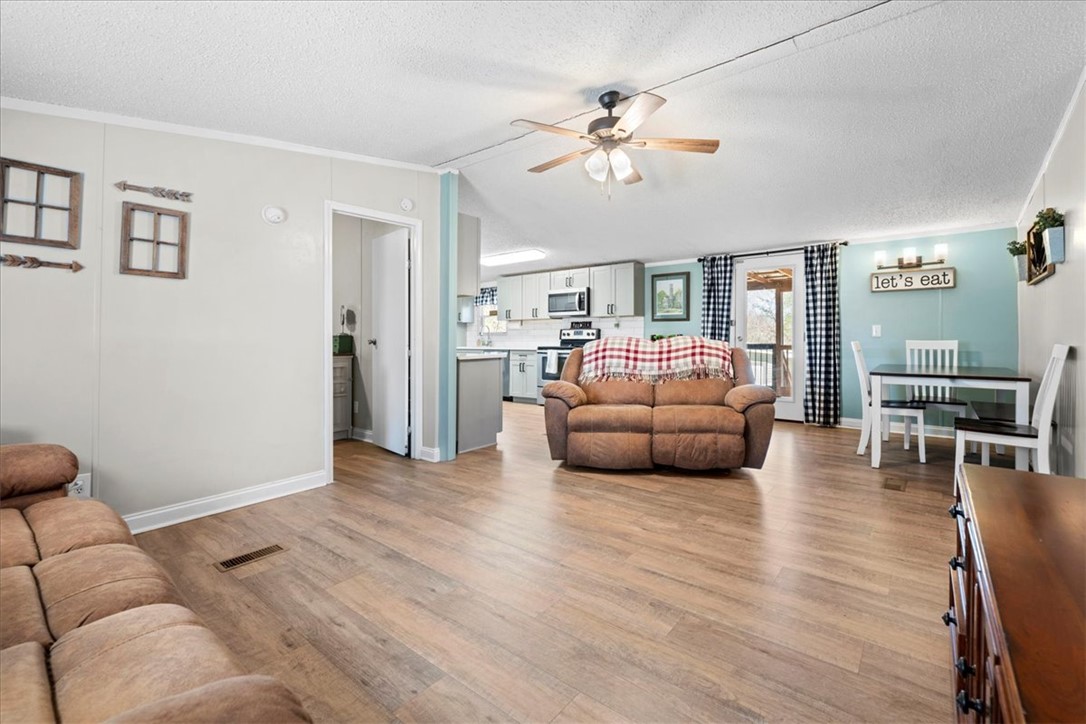 116 Steve Nix Road Seneca, SC 29678 - Photo 11 of 50 Living room with LVP flooring