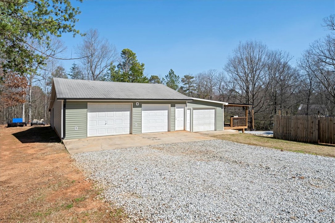 116 Steve Nix Road Seneca, SC 29678 - Photo 23 of 50 Three stall garage with concrete floor