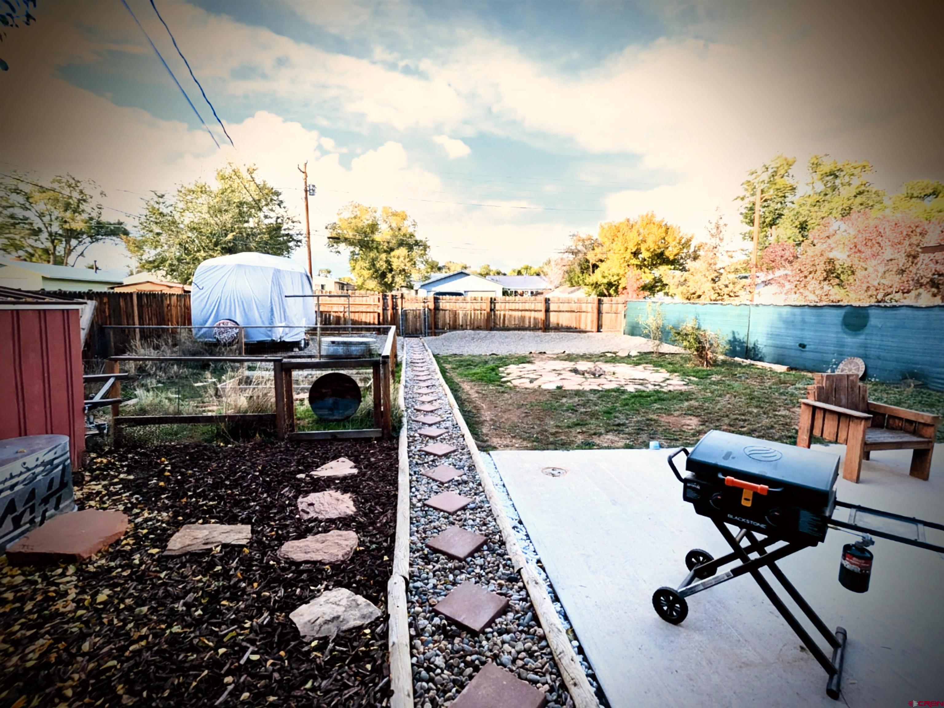 714 East 3rd Street Cortez, CO 81321 - Photo 14 of 14 a view of a chairs and table in the terrace