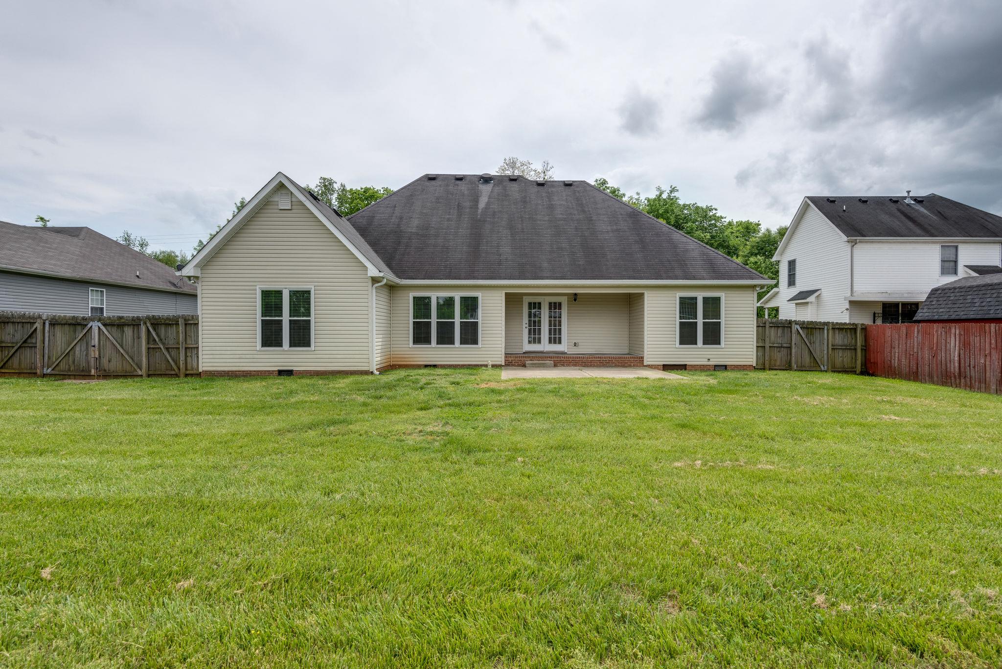 3753 Trough Springs Road Adams, TN 37010 - Photo 25 of 28 a view of a house with a backyard