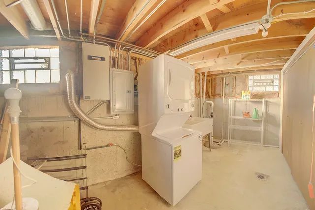 a bathroom with a sink and shower