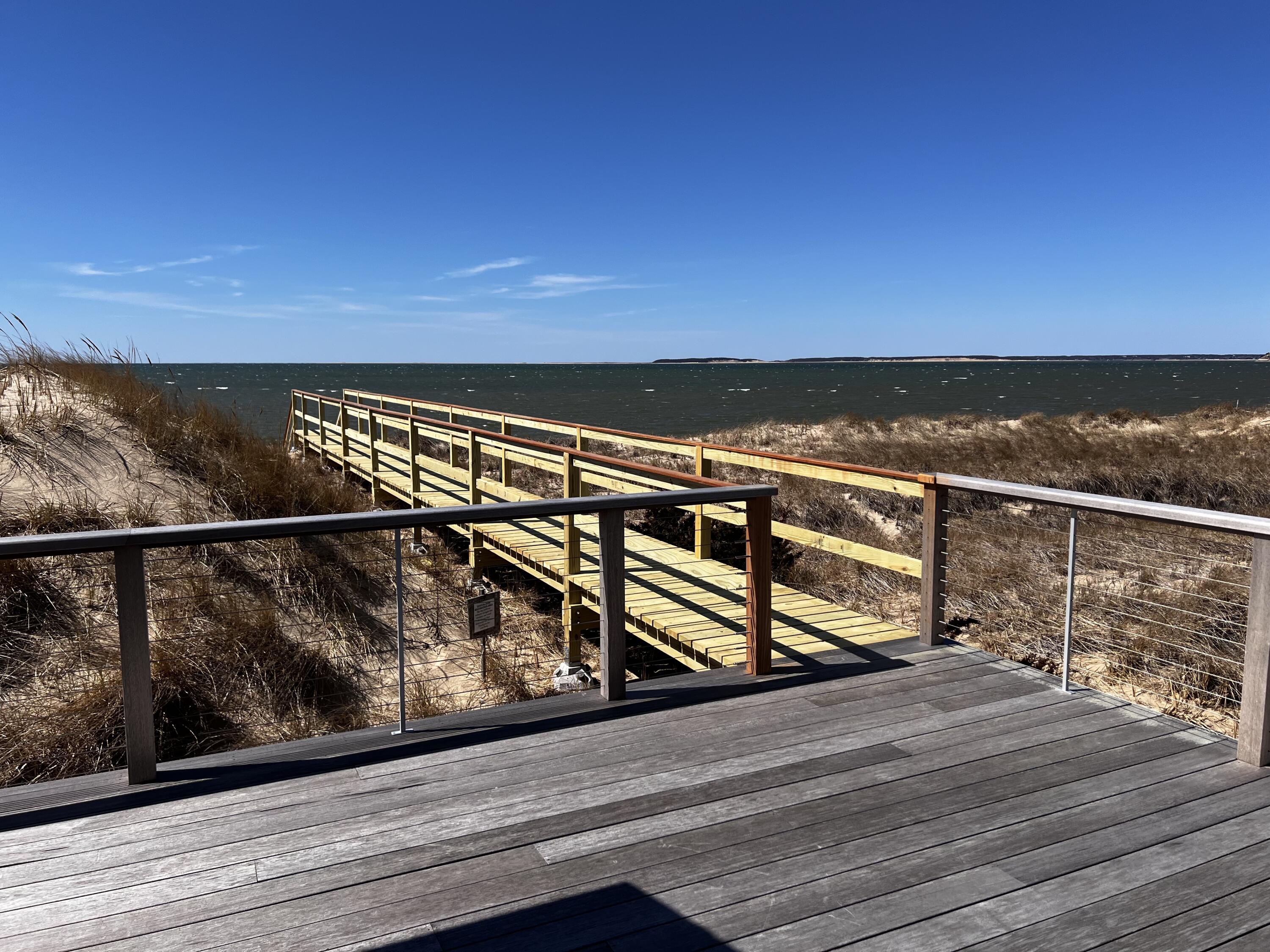165 Harmes Way Eastham, MA 02642 - Photo 22 of 36 a view of wooden floor with a lake