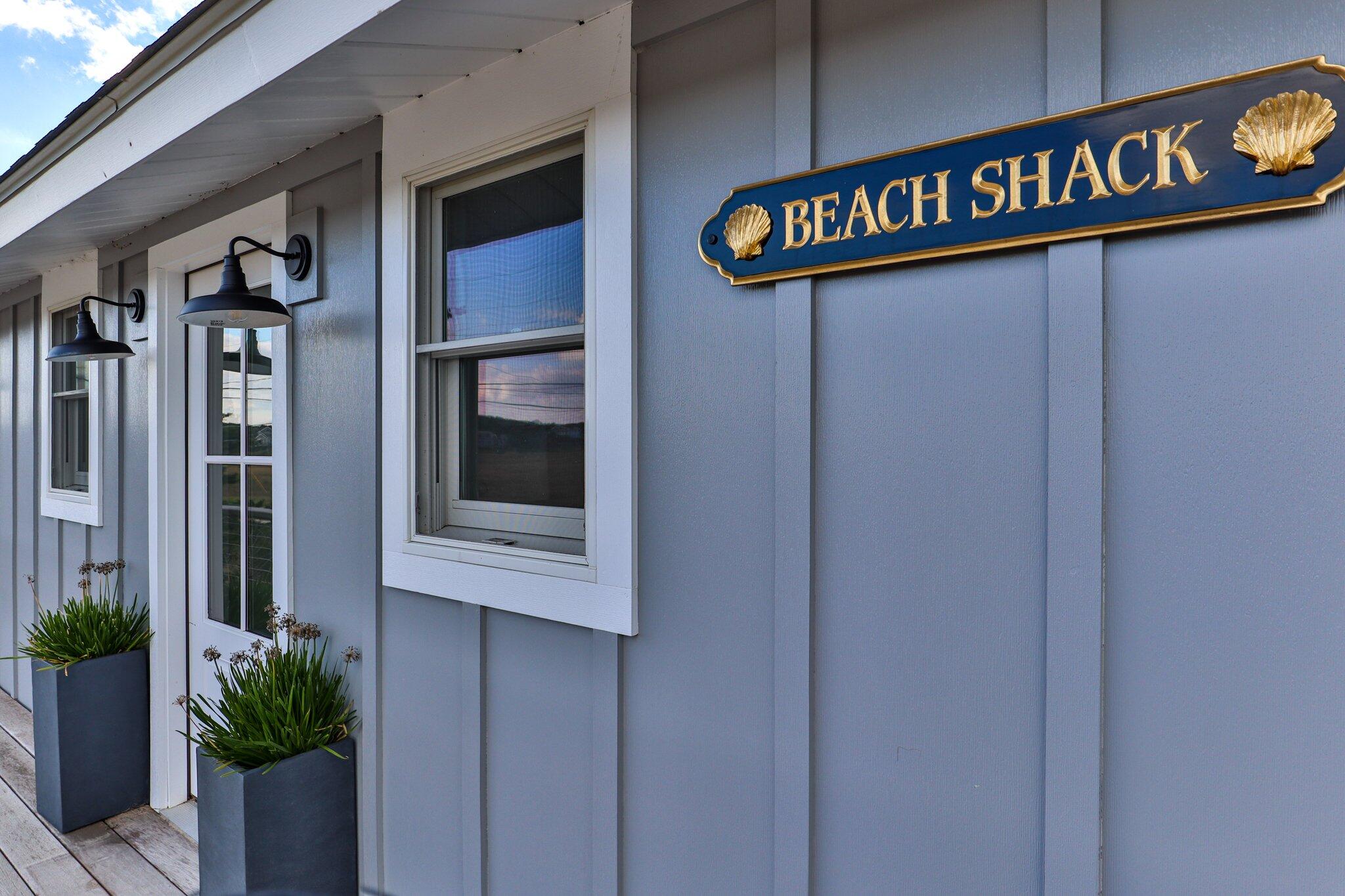 165 Harmes Way Eastham, MA 02642 - Photo 24 of 36 a close up of a street sign