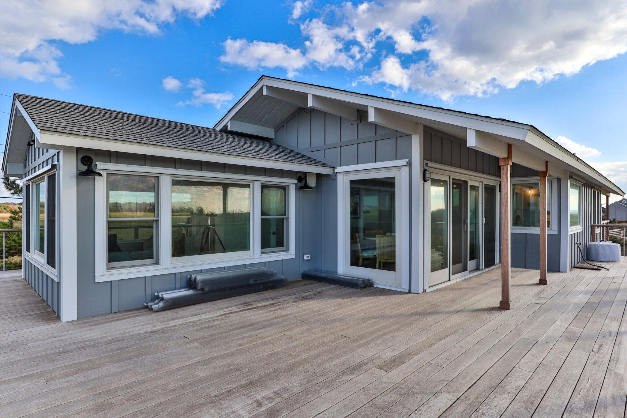 165 Harmes Way Eastham, MA 02642 - Photo 25 of 36 a view of a house with wooden floor and roof
