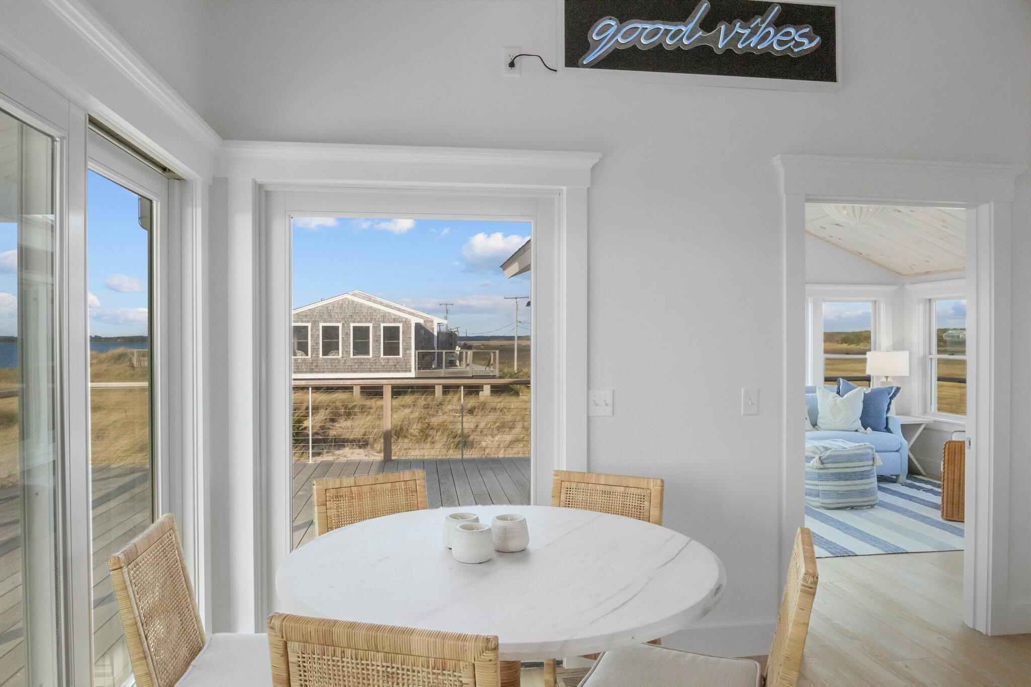 165 Harmes Way Eastham, MA 02642 - Photo 3 of 36 a bathroom with a sink and a mirror