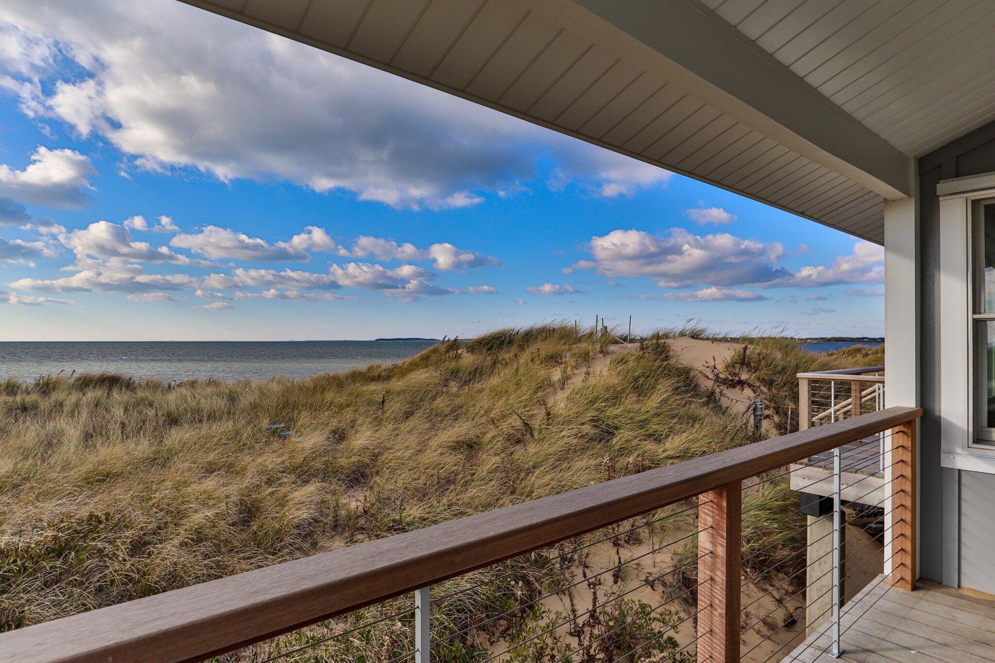 165 Harmes Way Eastham, MA 02642 - Photo 33 of 36 a view of a city from a balcony