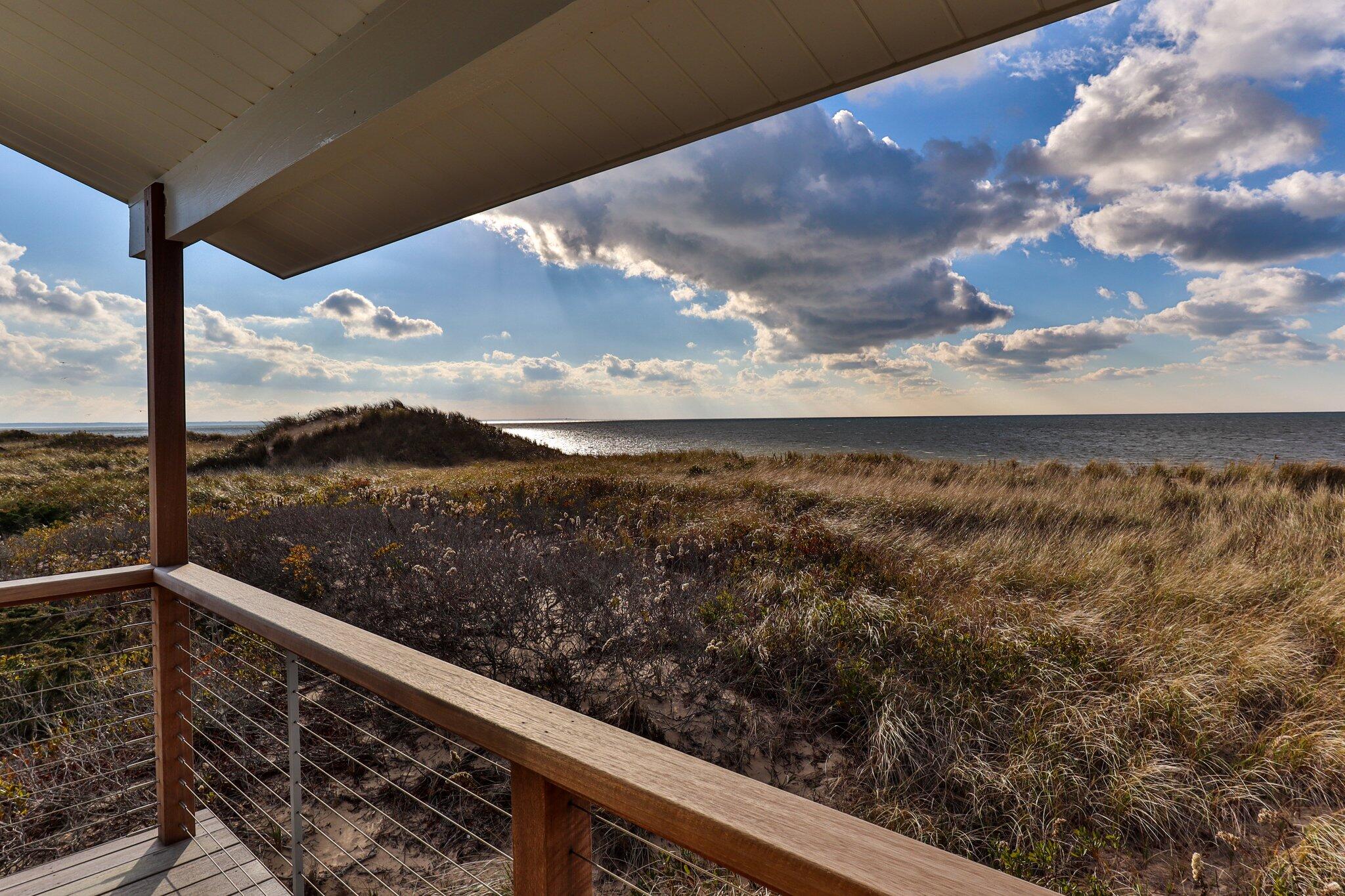 165 Harmes Way Eastham, MA 02642 - Photo 34 of 36 a view of a balcony with an outdoor space