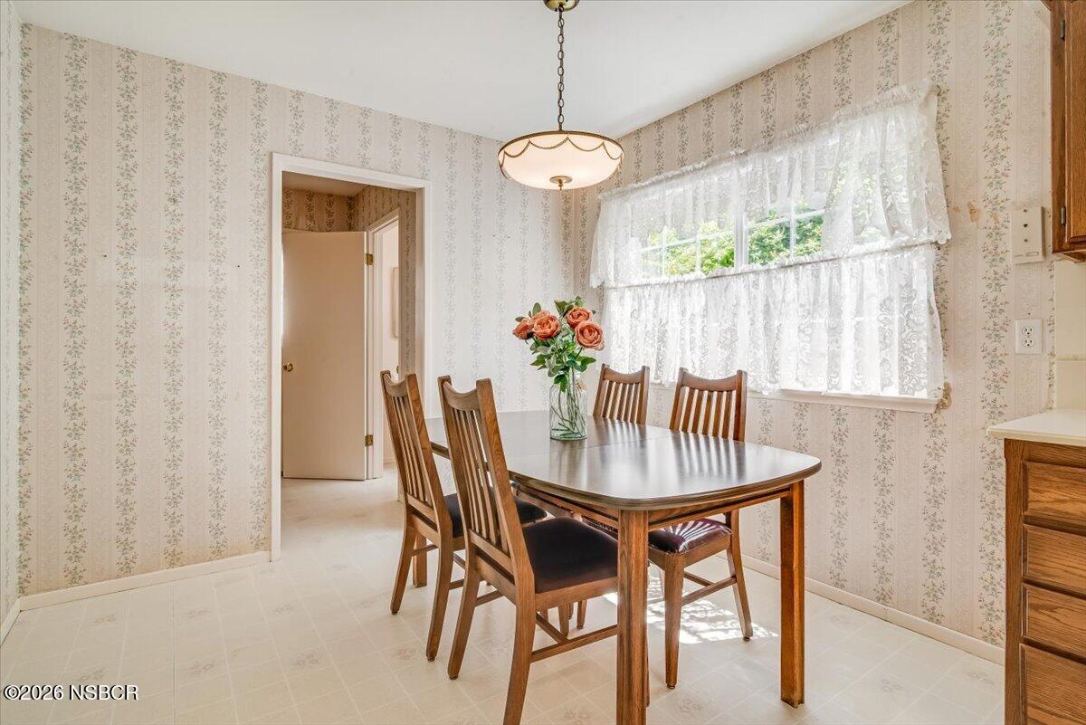 416 South Hawthorne Street Lompoc, CA 93436 - Photo 11 of 29 a dining room with furniture and window