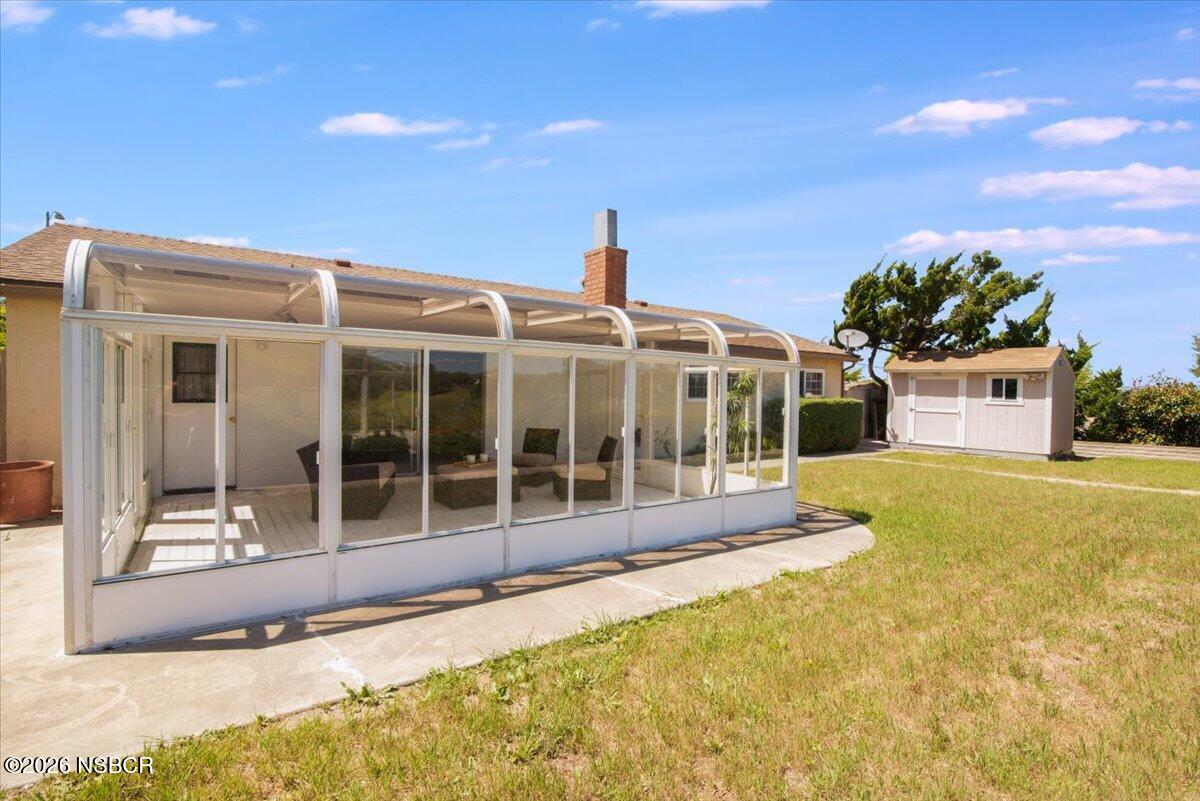 416 South Hawthorne Street Lompoc, CA 93436 - Photo 25 of 29 a view of a house with a swimming pool