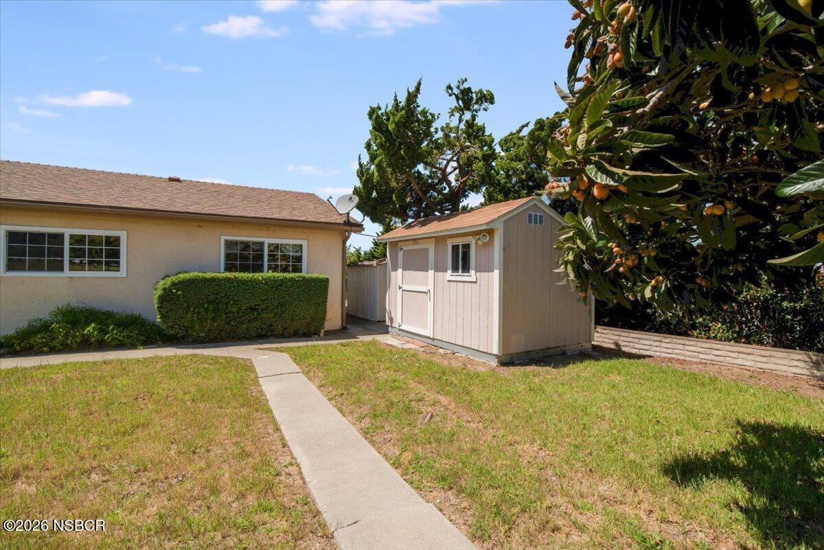 416 South Hawthorne Street Lompoc, CA 93436 - Photo 27 of 29 a view of house with yard and garage
