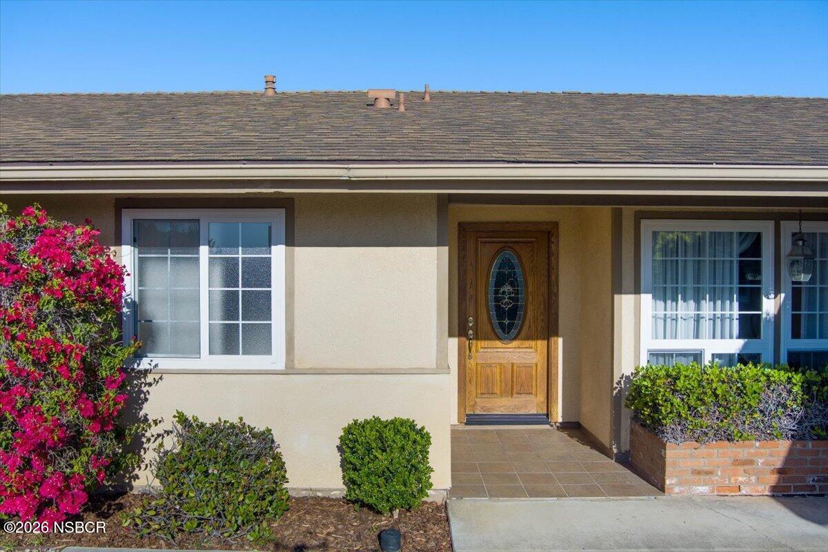 416 South Hawthorne Street Lompoc, CA 93436 - Photo 3 of 29 a front view of a house with a porch