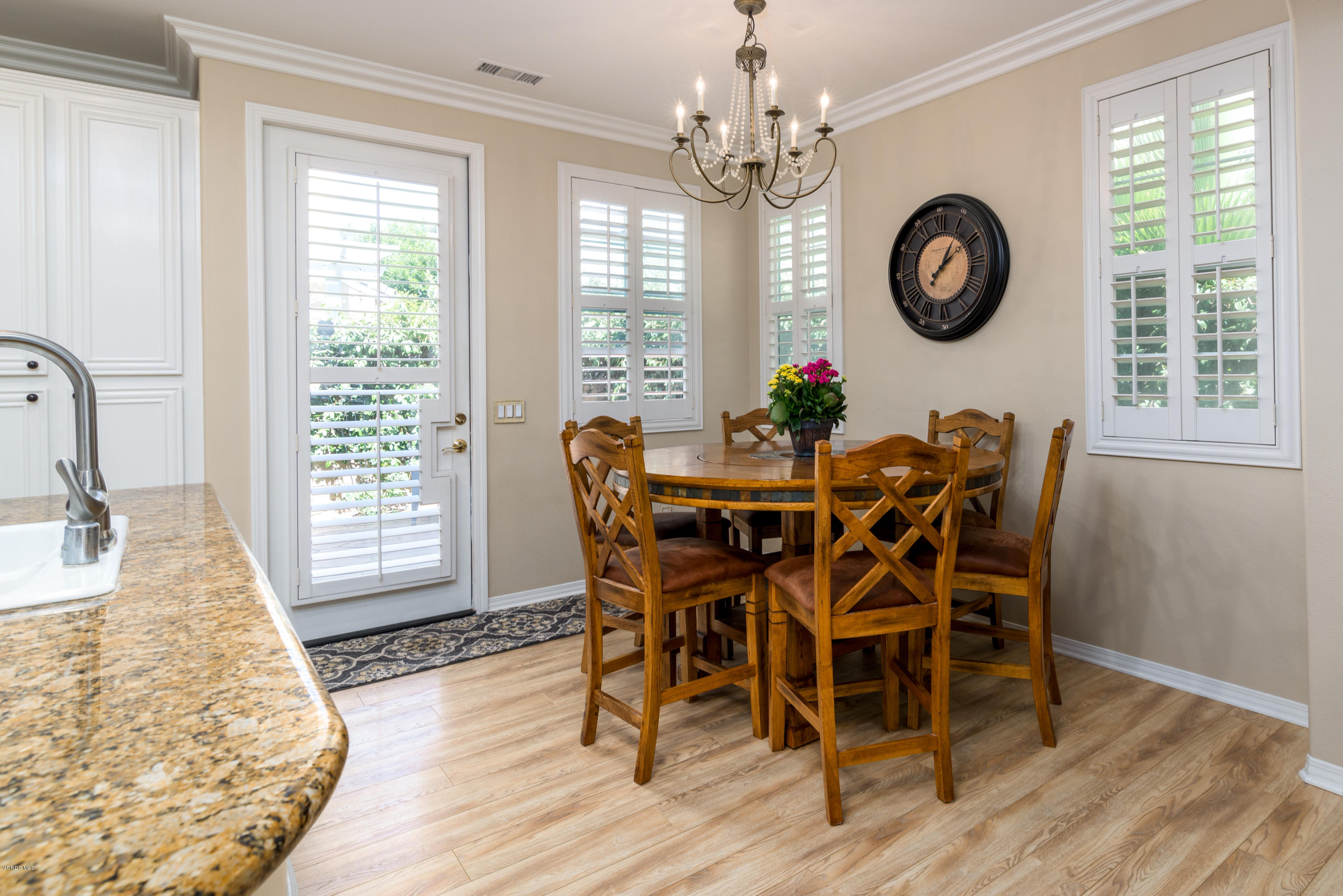 421 Spring Park Road Camarillo, CA 93012 - Photo 15 of 51 a view of a dining room with furniture window and wooden floor
