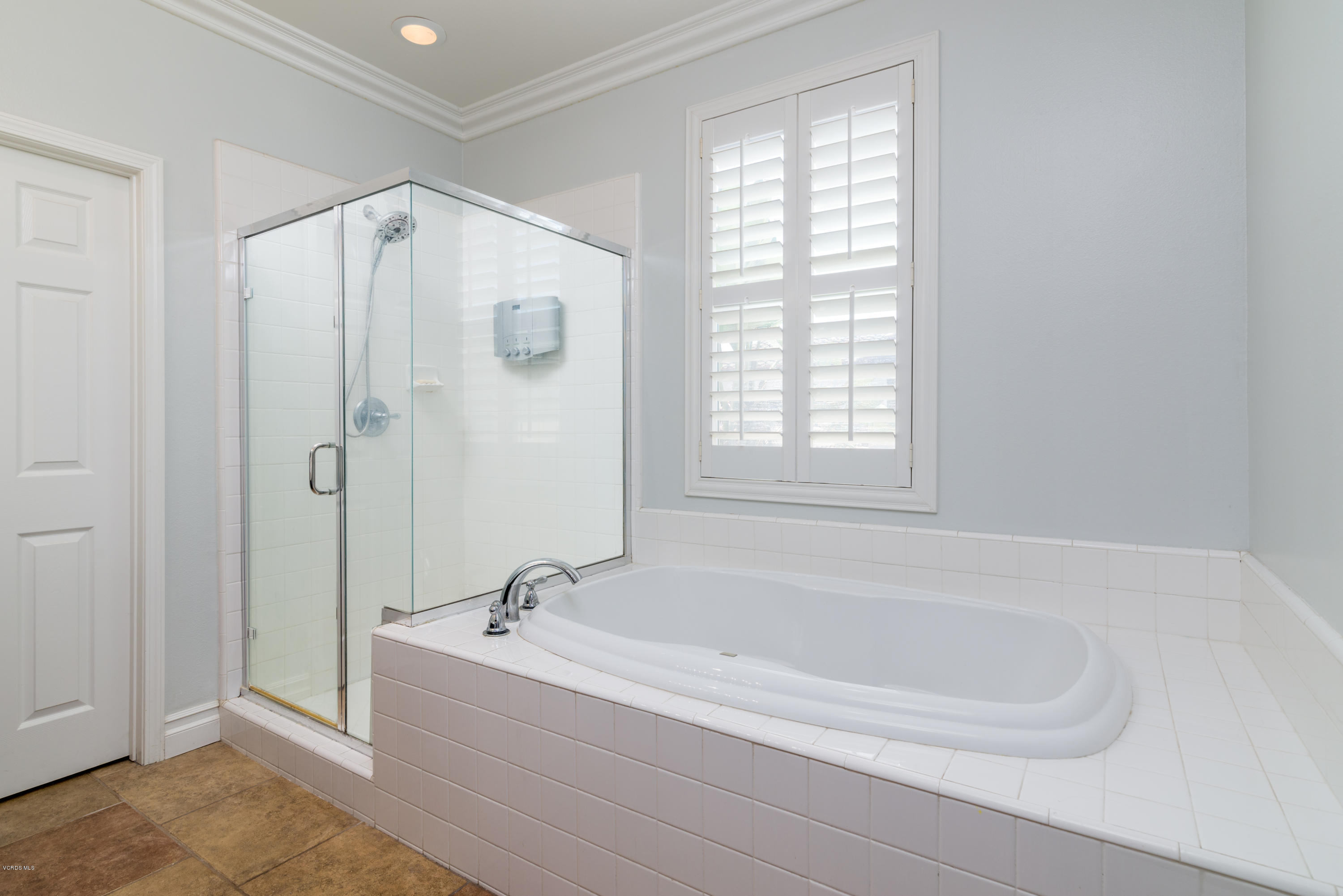 421 Spring Park Road Camarillo, CA 93012 - Photo 19 of 51 a white bath tub sitting next to a window