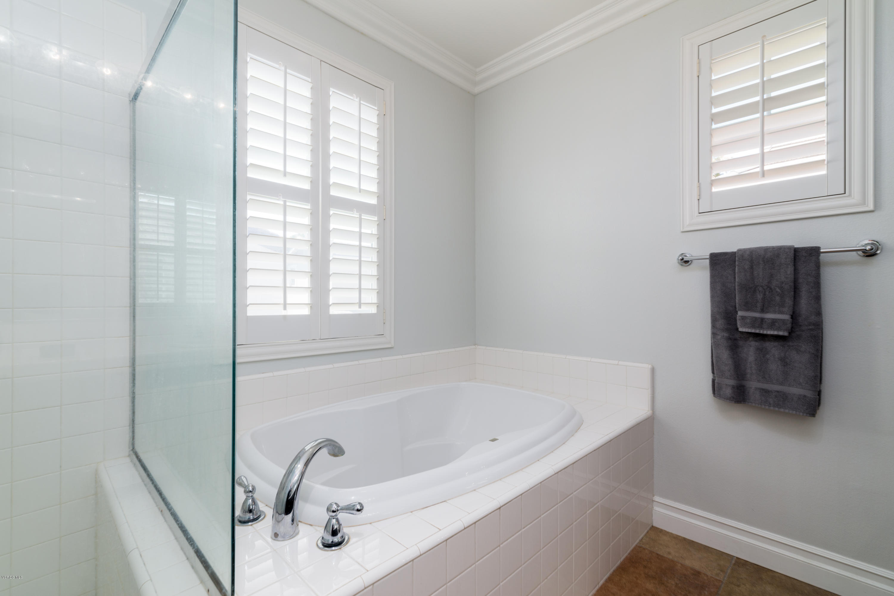 421 Spring Park Road Camarillo, CA 93012 - Photo 21 of 51 a white bath tub sitting in a bathroom next to a window