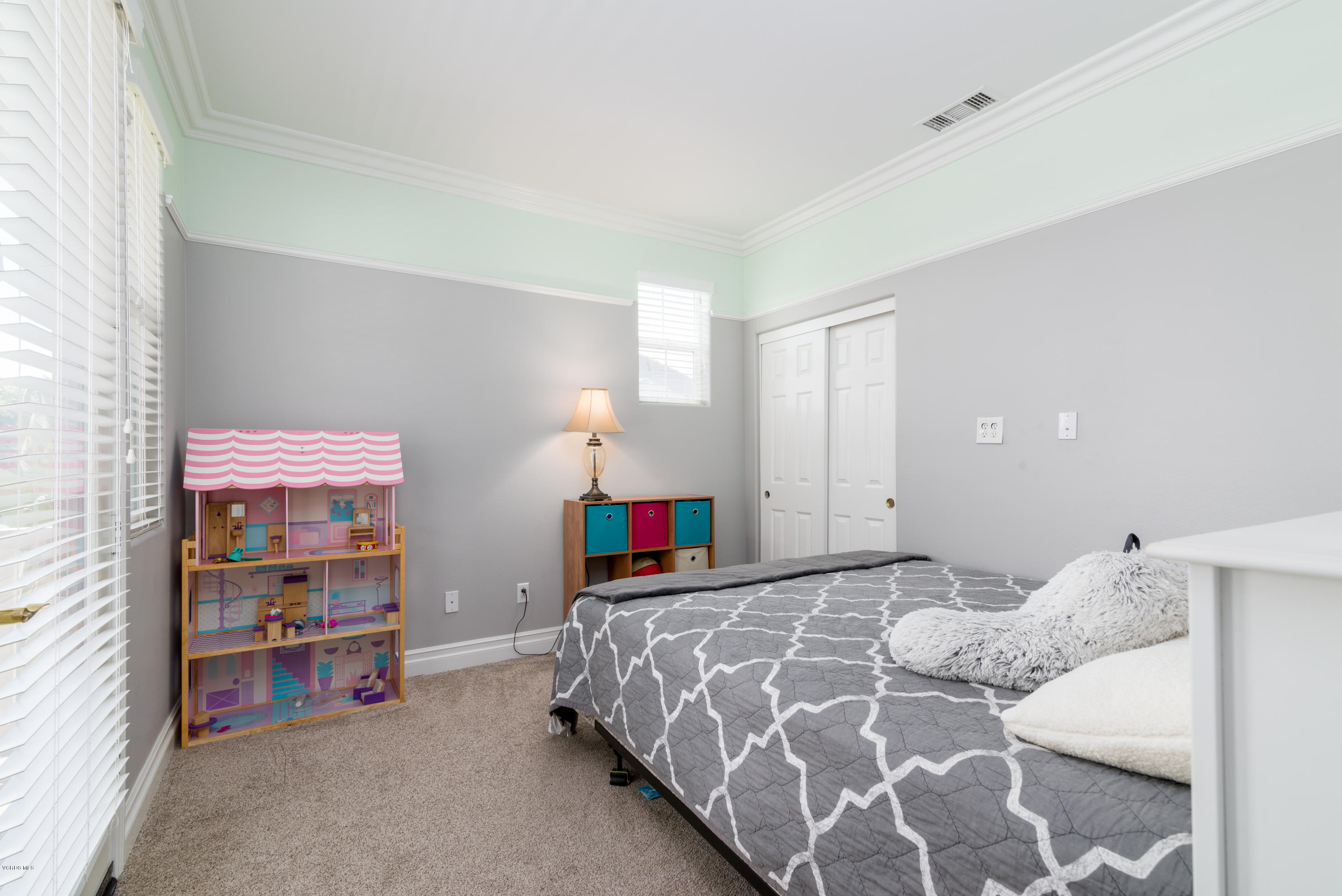 421 Spring Park Road Camarillo, CA 93012 - Photo 22 of 51 a bedroom with a bed and a window