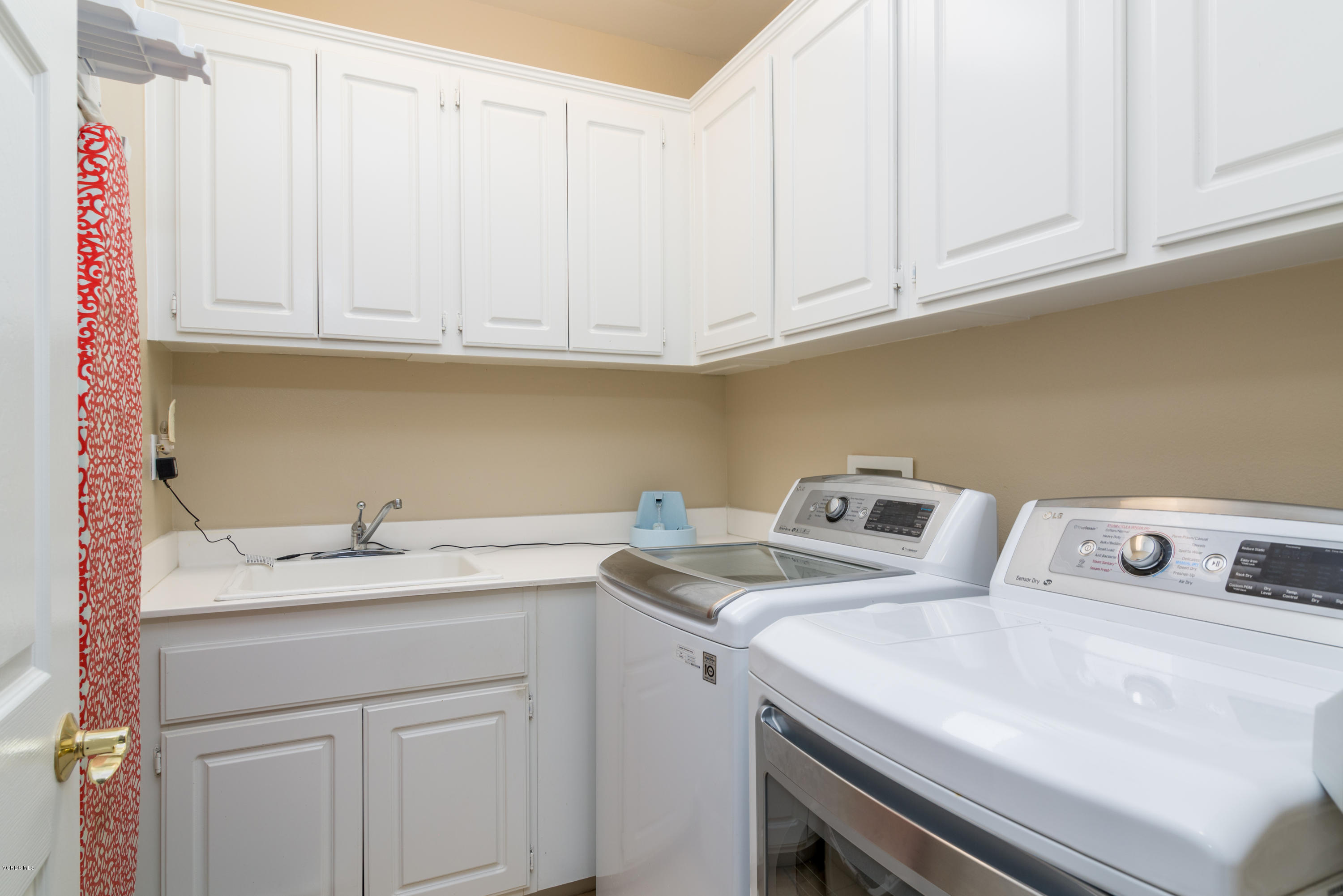421 Spring Park Road Camarillo, CA 93012 - Photo 28 of 51 a utility room with dryer and washer