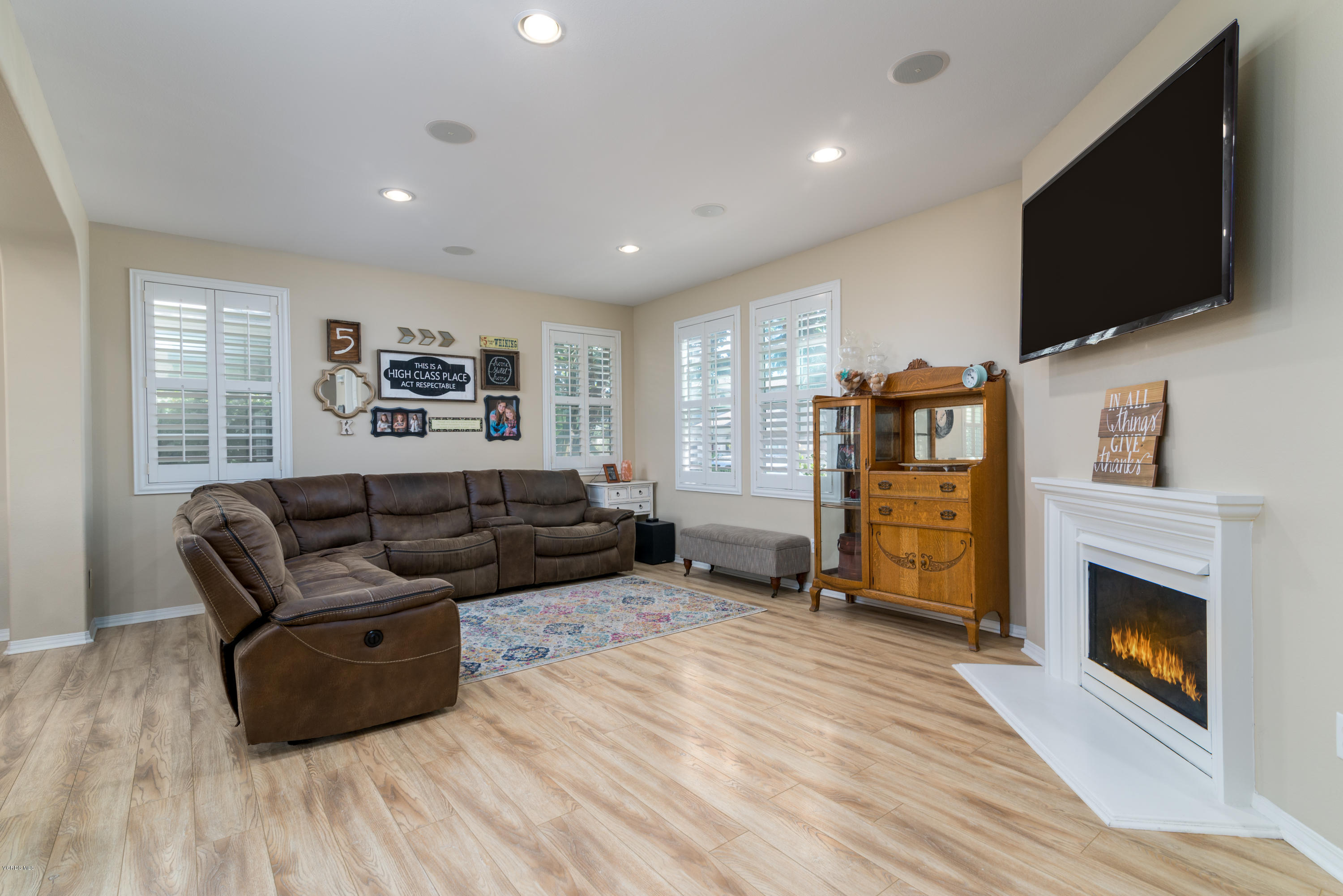 421 Spring Park Road Camarillo, CA 93012 - Photo 8 of 51 a living room with furniture and a flat screen tv