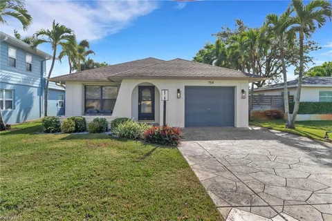 $699,900 | 754 95th Avenue North, Naples, FL 34108