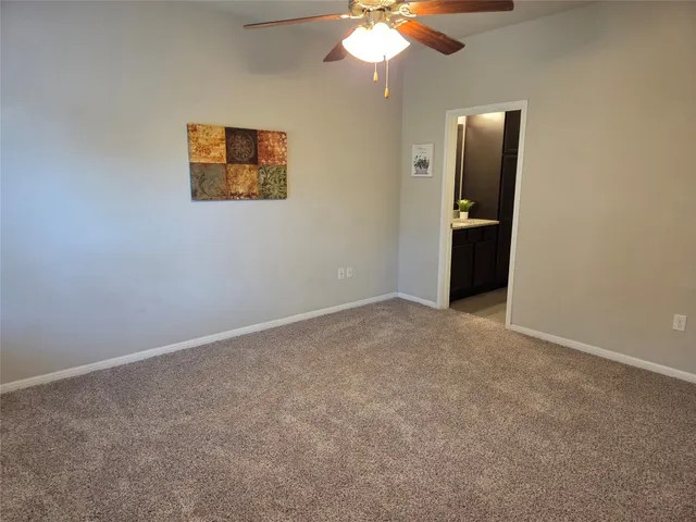 an empty room with a bathroom