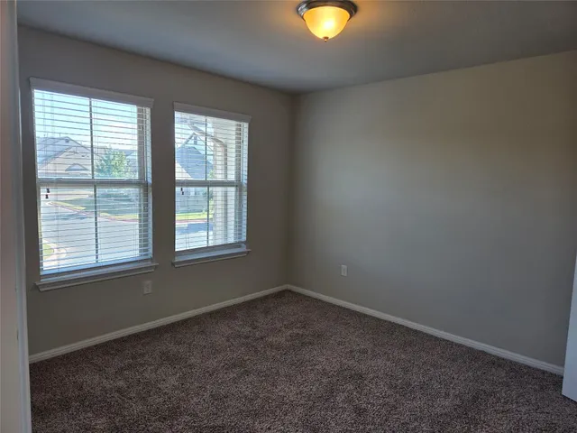 an empty room with window