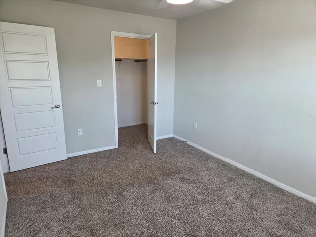 wooden floor and closet in a room