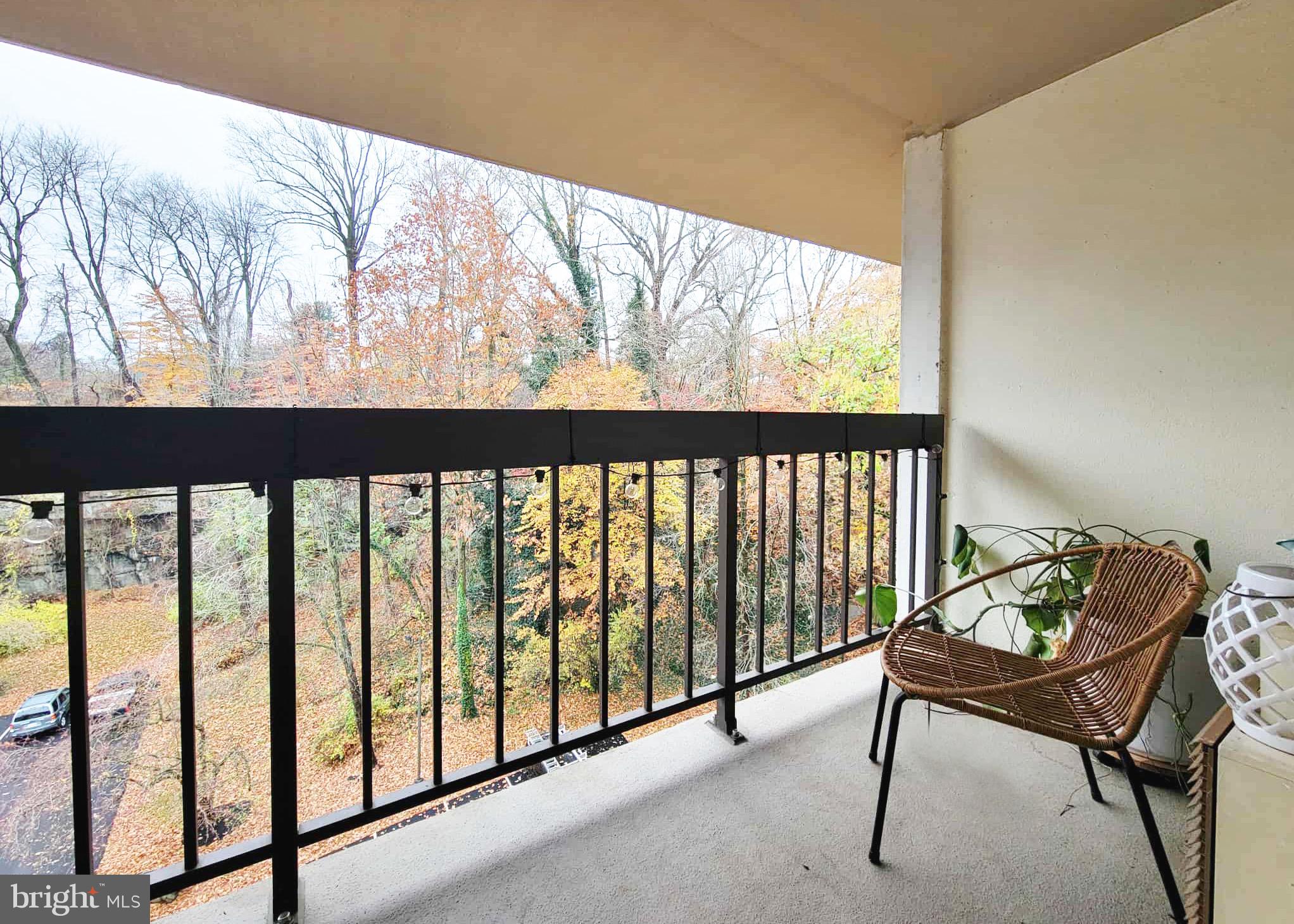 800 Avondale Road, Unit 7N Wallingford, PA 19086 - Photo 6 of 32 a view of a porch with furniture and a gate
