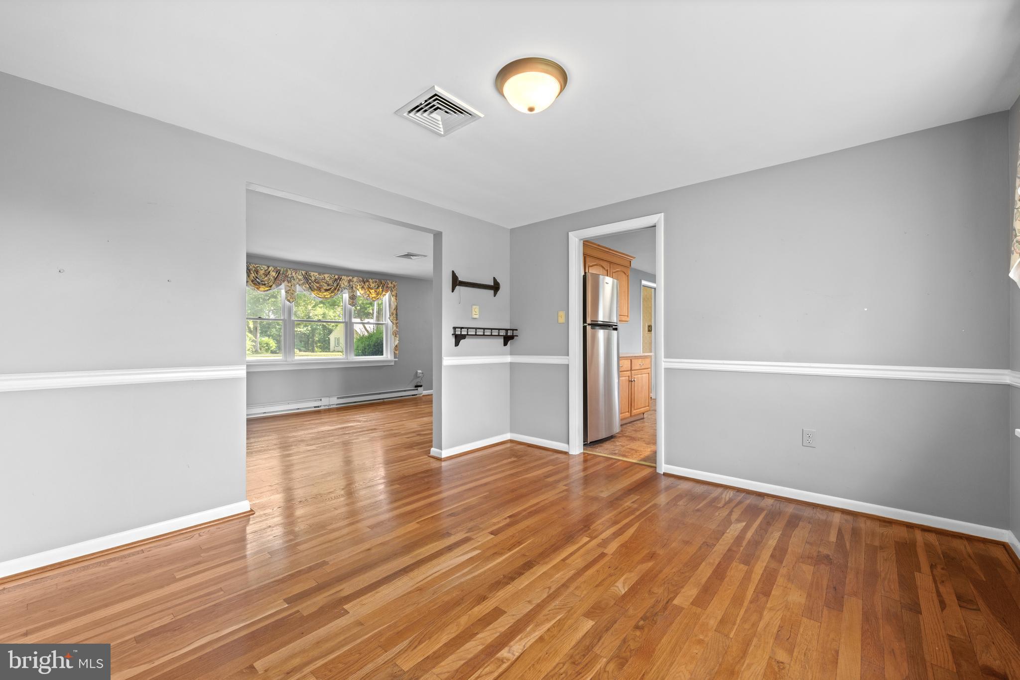 258 Monacy Road Coatesville, PA 19320 - Photo 26 of 54 wooden floor in an empty room with a window