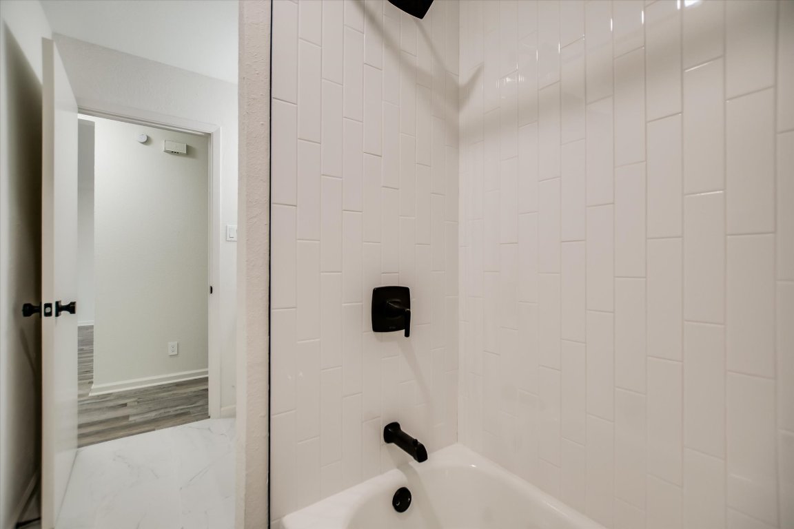7003 Castlekeep Way Austin, TX 78745 - Photo 19 of 23 a bathroom with a shower