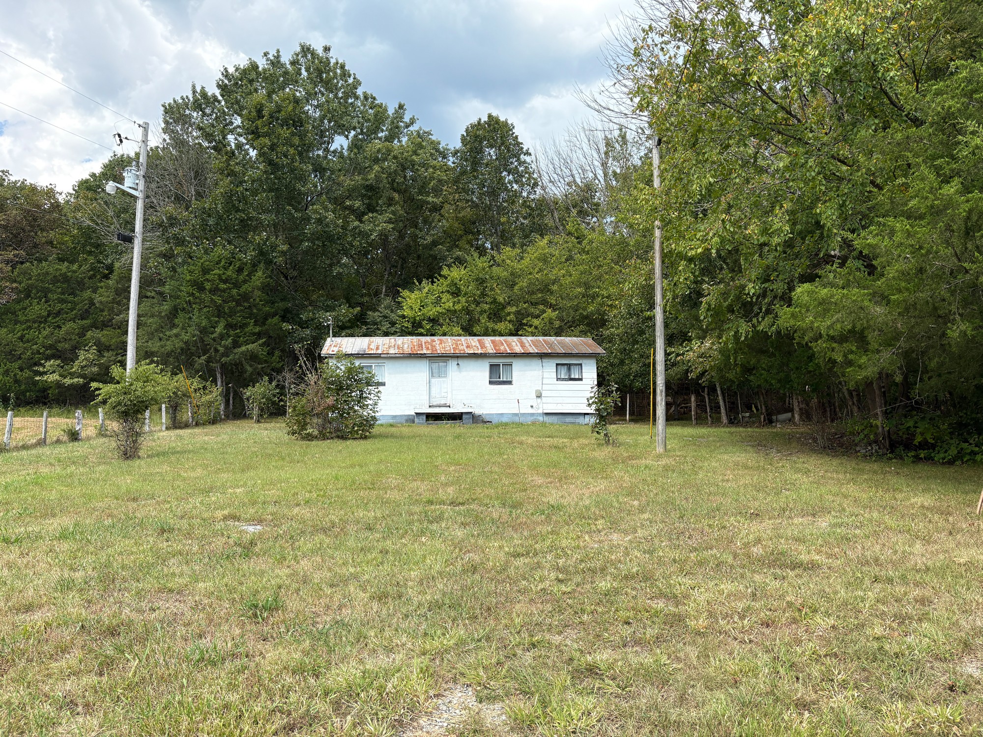 664 Reed Hollow Road Readyville, TN 37149 - Photo 1 of 4 a house view with a outdoor space
