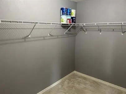 a view of a room with racks on the wall